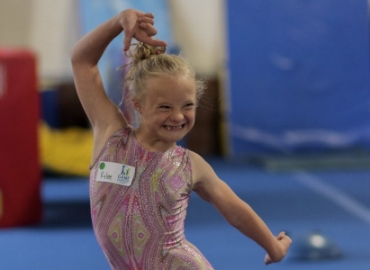 girls doing a gymnastics routine